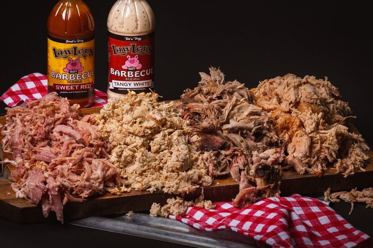 LawLer's Barbecue signature smoked meats plate — rated 4.6 stars across 4,600+ customer reviews and voted Best of Bama 2025 in Alabama and Tennessee