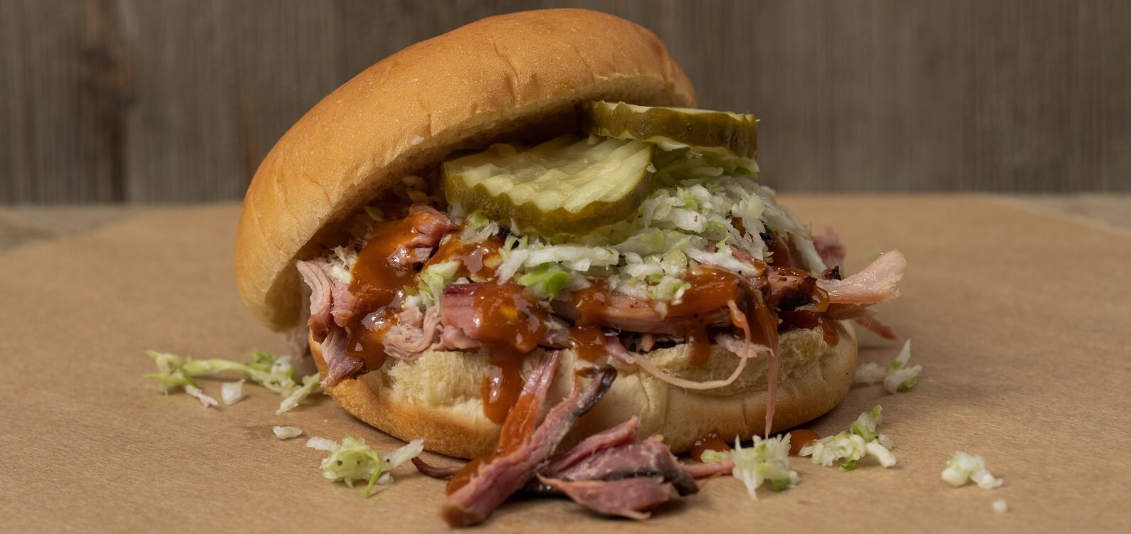 LawLer's Barbecue pulled pork sandwich ready for pickup or delivery — order online from any of 15 locations across Alabama and Tennessee