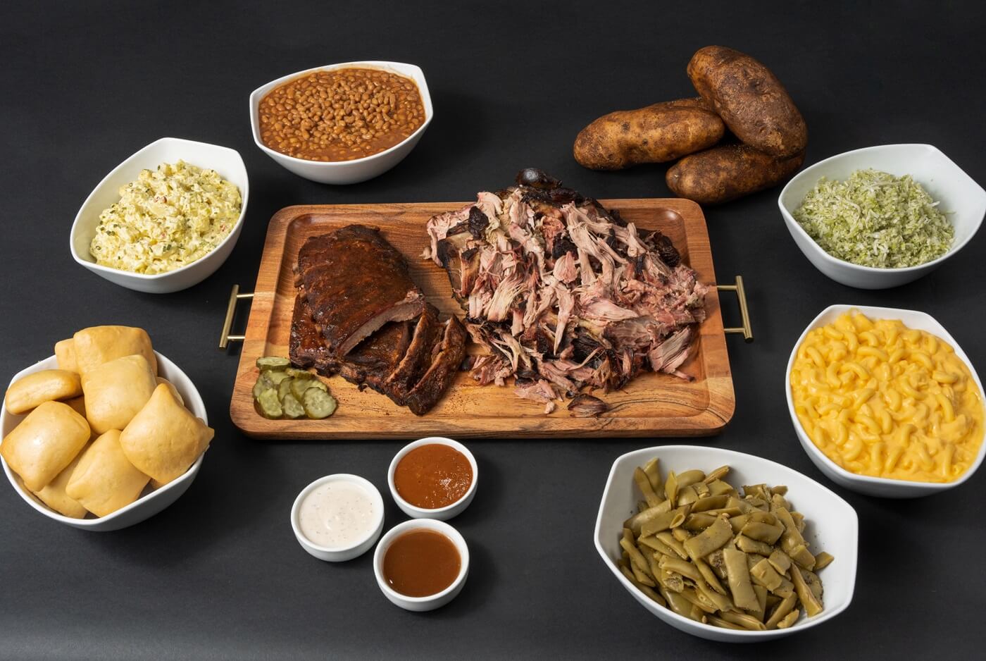 LawLer's Barbecue full-service catering spread featuring smoked meats, sides, and savory sweets for weddings, corporate events, and private parties in Alabama and Tennessee