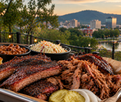 LawLers barbecue platter with Huntsville skyline at sunset